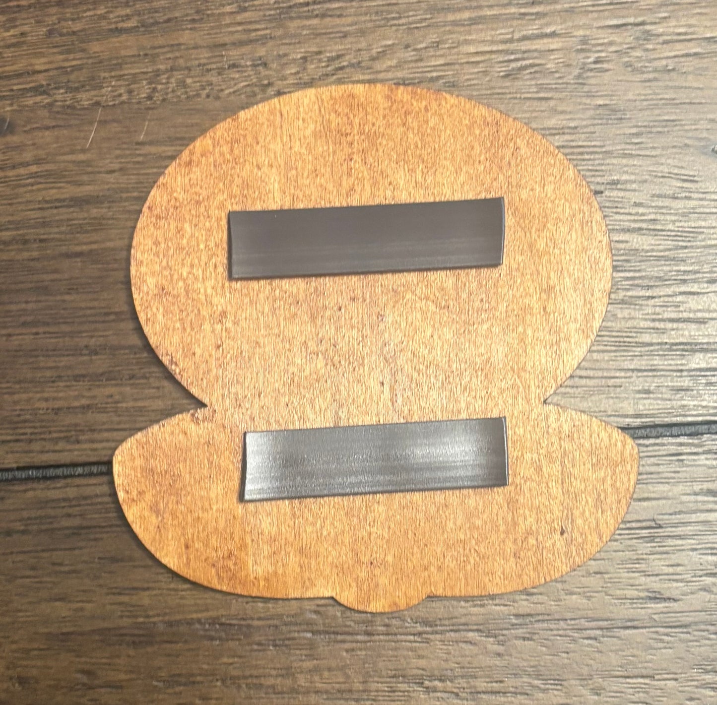 Stained basswood fridge magnet of a Flower power up from the Mario video games