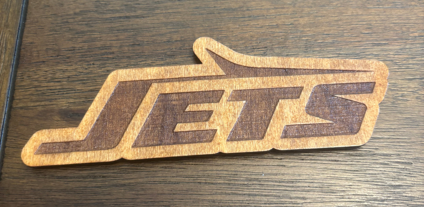 Stained basswood fridge magnet of the New York Jets football team logo