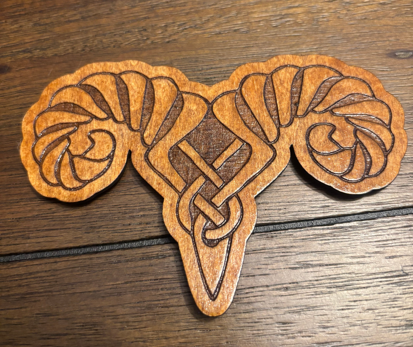 Stained basswood fridge magnet of the Markarth sigil from the Skyrim video game