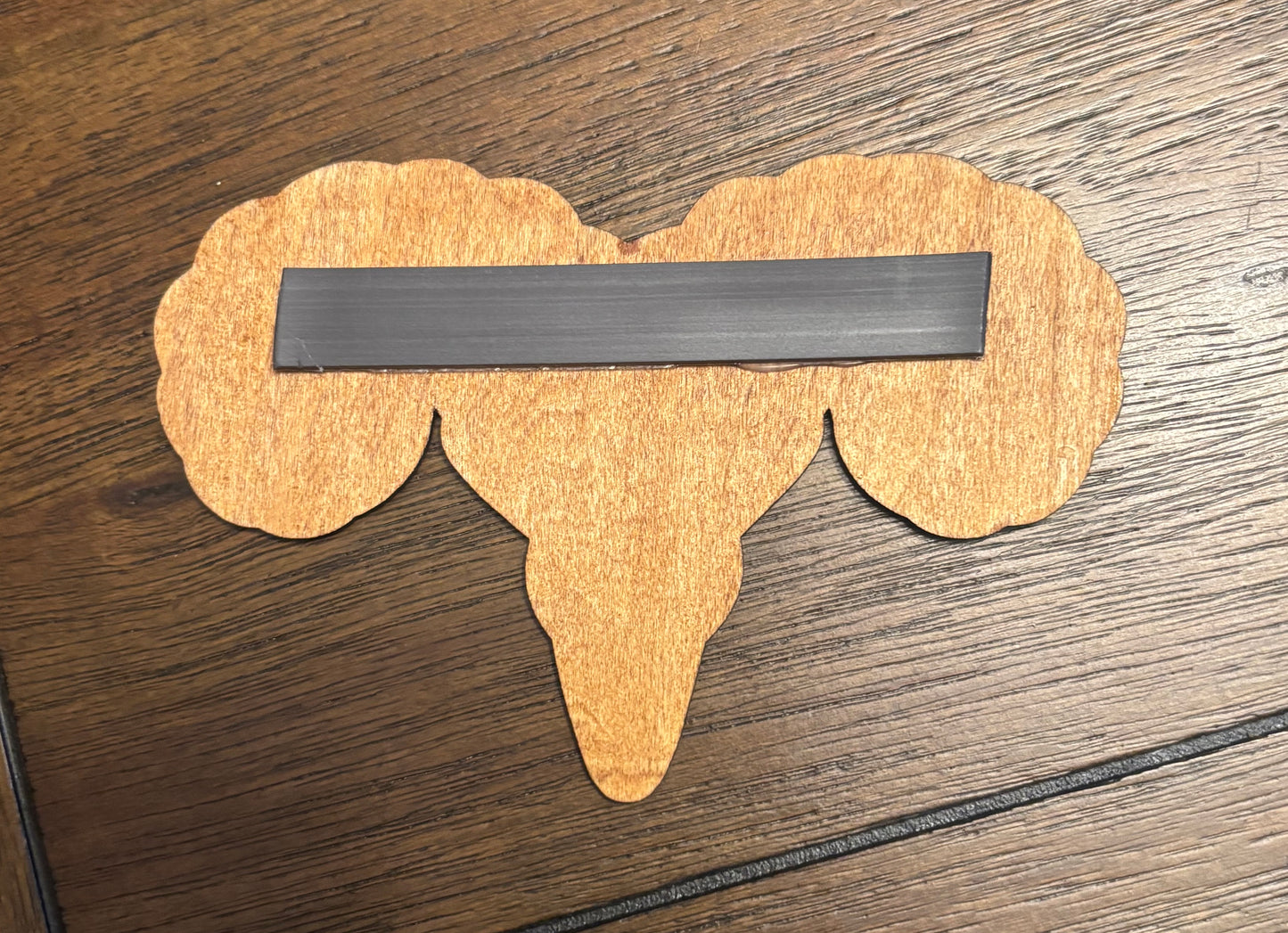 Stained basswood fridge magnet of the Markarth sigil from the Skyrim video game
