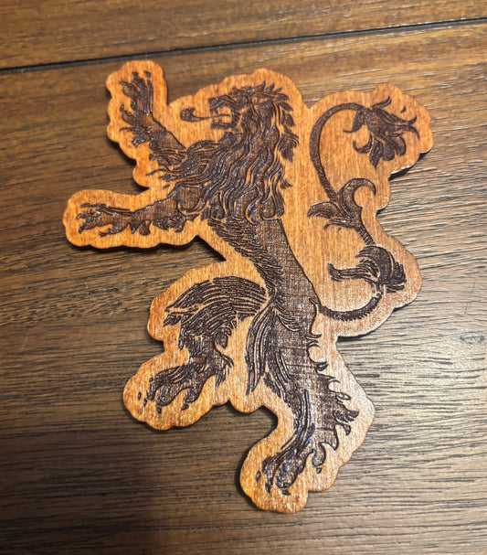 Stained basswood fridge magnet of the House Lannister sigil from Game of Thrones