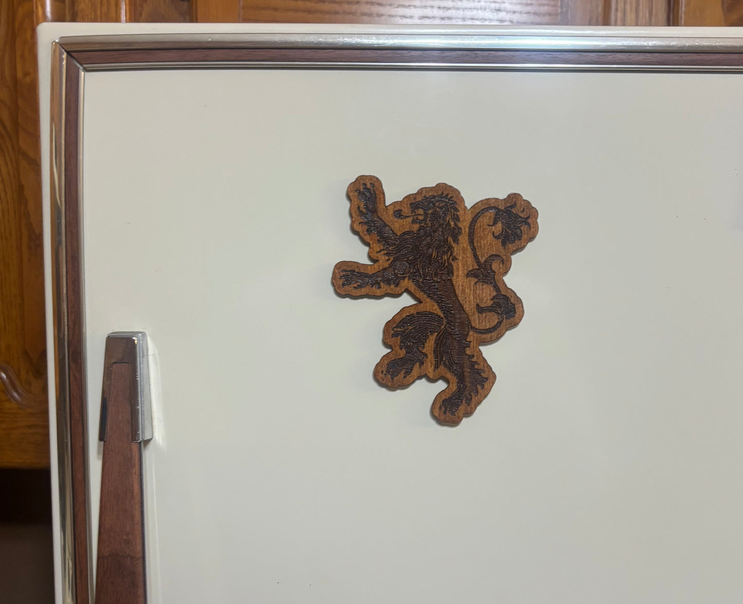 Stained basswood fridge magnet of the House Lannister sigil from Game of Thrones