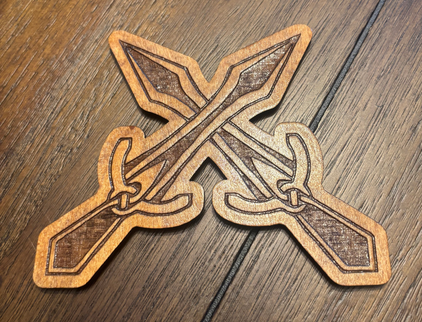 Stained basswood fridge magnet of the Riften sigil from the Skyrim video game