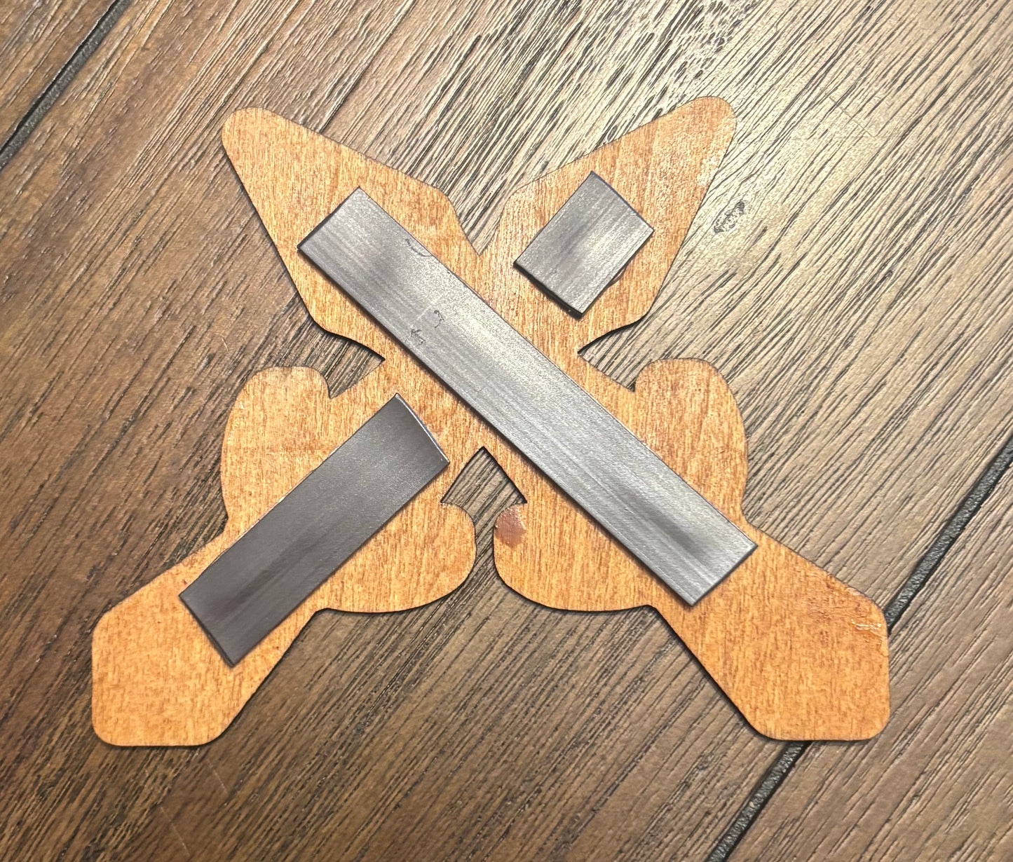 Stained basswood fridge magnet of the Riften sigil from the Skyrim video game