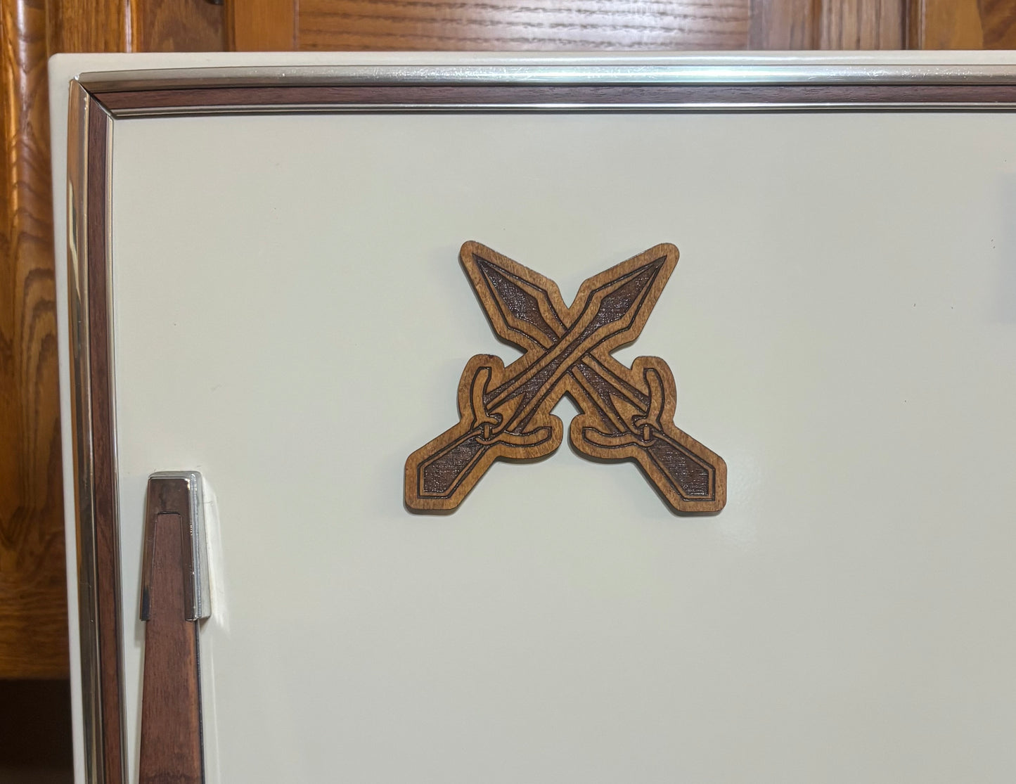 Stained basswood fridge magnet of the Riften sigil from the Skyrim video game