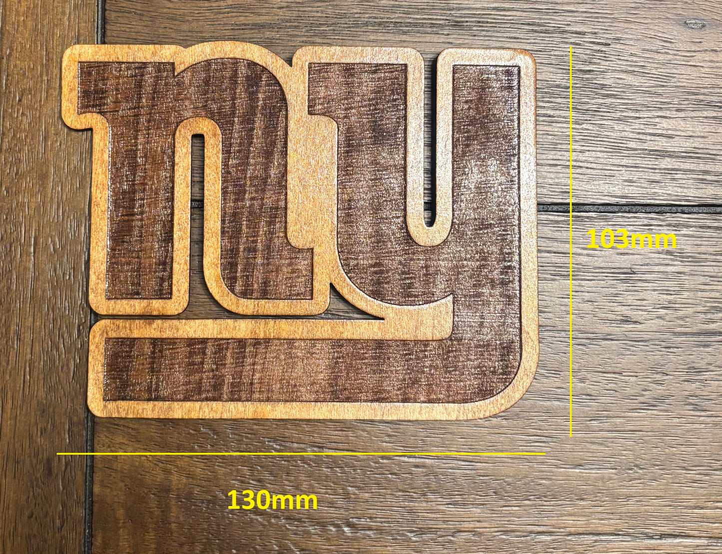 Stained basswood fridge magnet of the New Yorki Giants football team logo