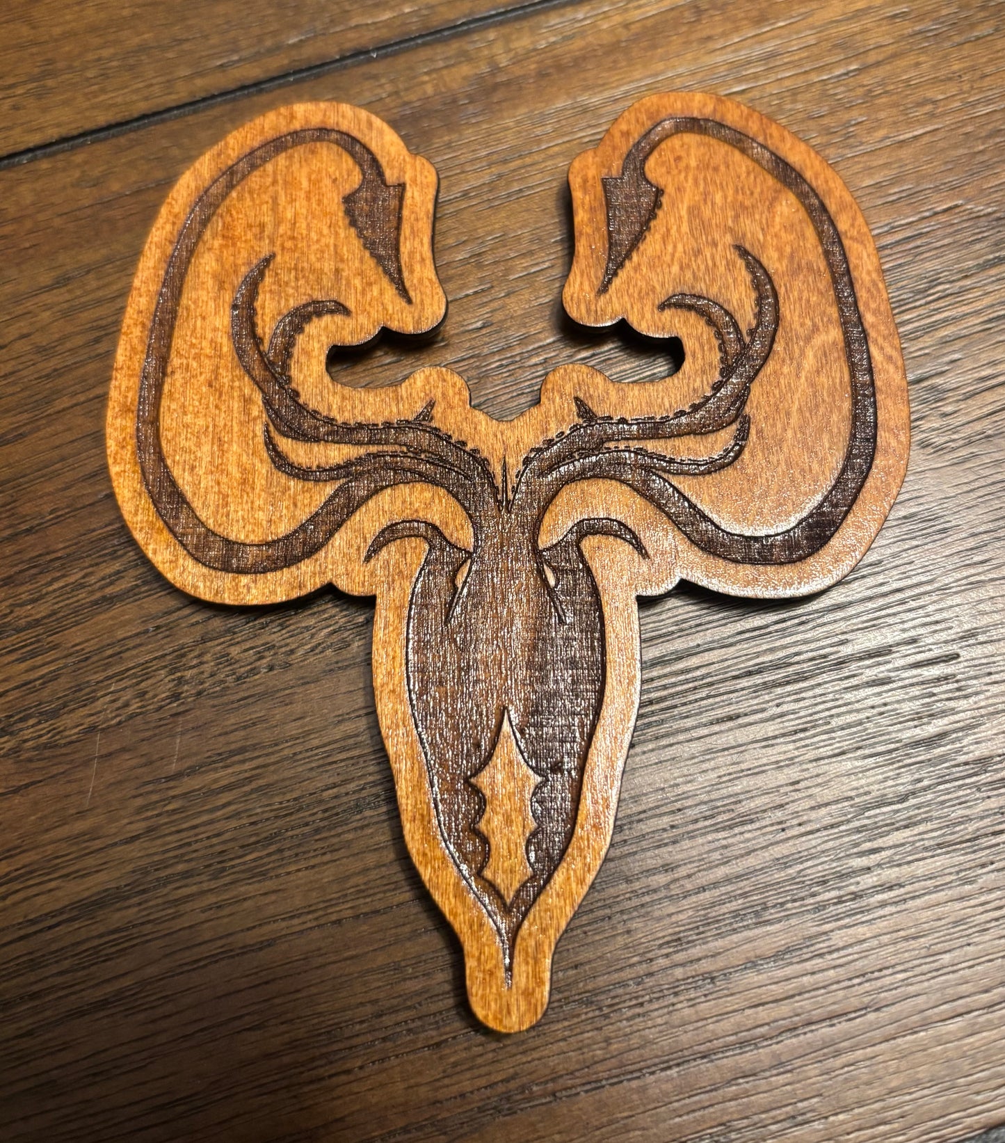 Stained basswood fridge magnet of the House Greyjoy sigil from Game of Thrones