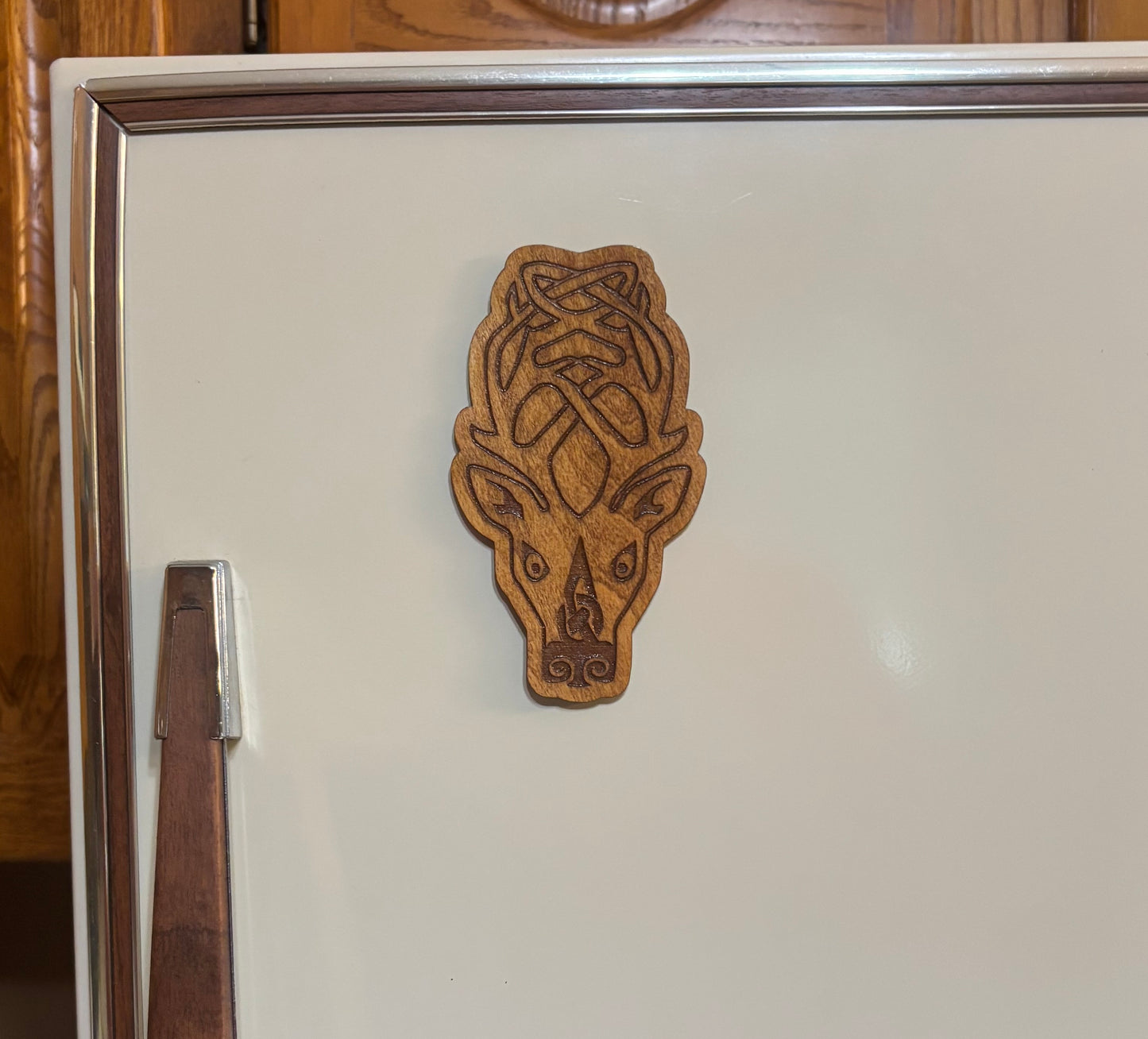 Stained basswood fridge magnet of the Falkreath sigil from the Skyrim video game