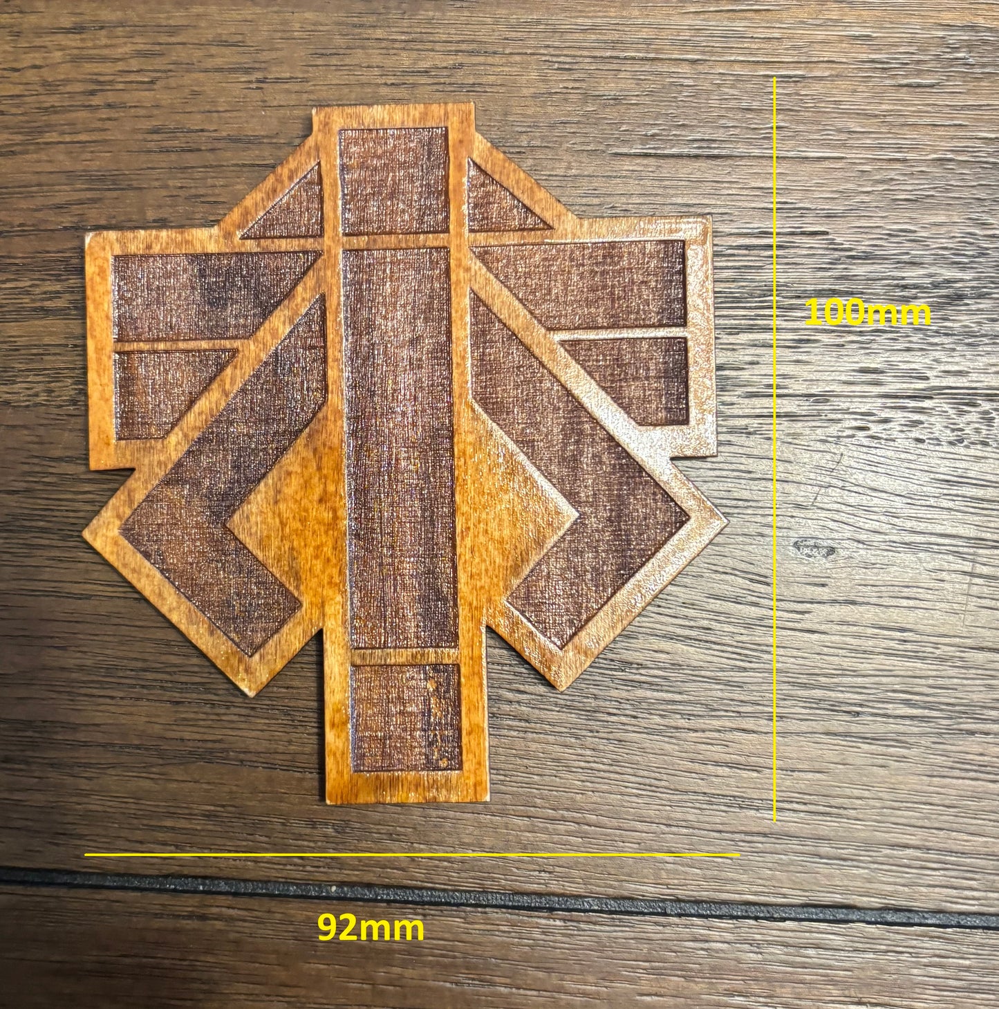 Stained basswood fridge magnet of the Advent logo from the X-COM video games
