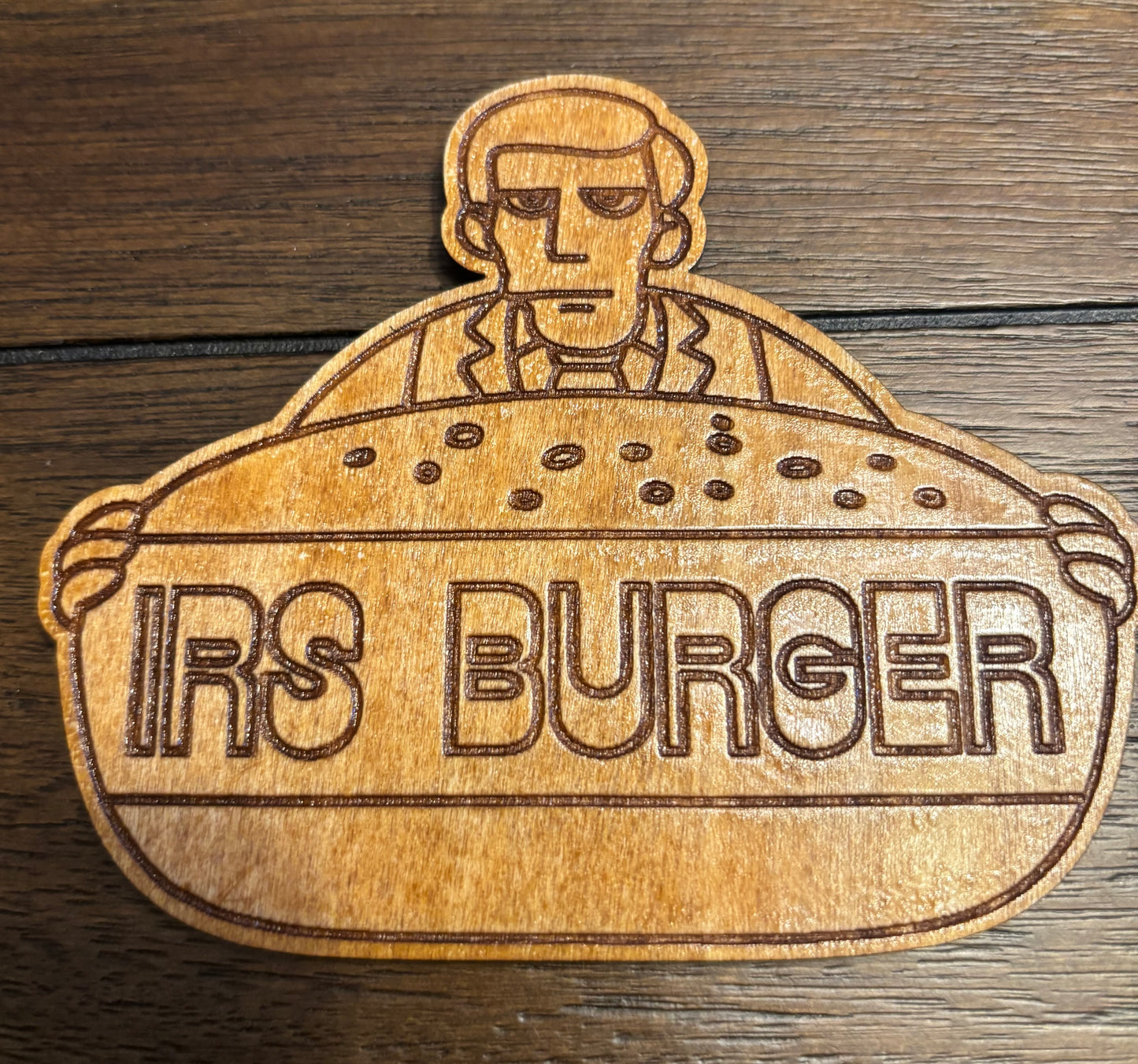 Stained basswood fridge magnet of IRS Burger logo from the Simpsons