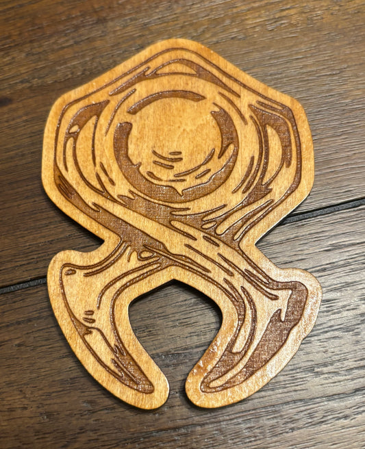 Stained basswood fridge magnet of the Horadrim symbol from the Diablo video games