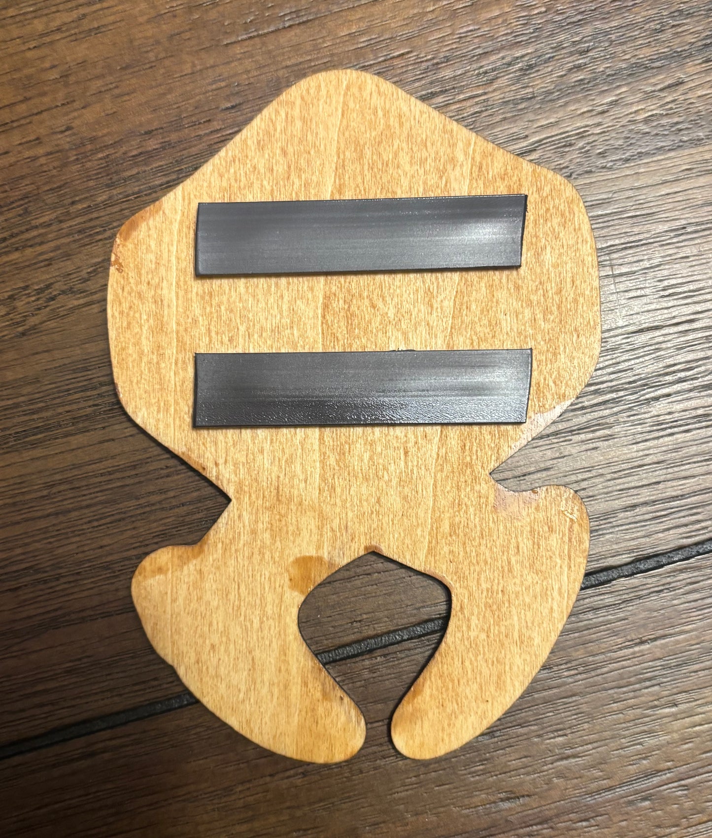 Stained basswood fridge magnet of the Horadrim symbol from the Diablo video games