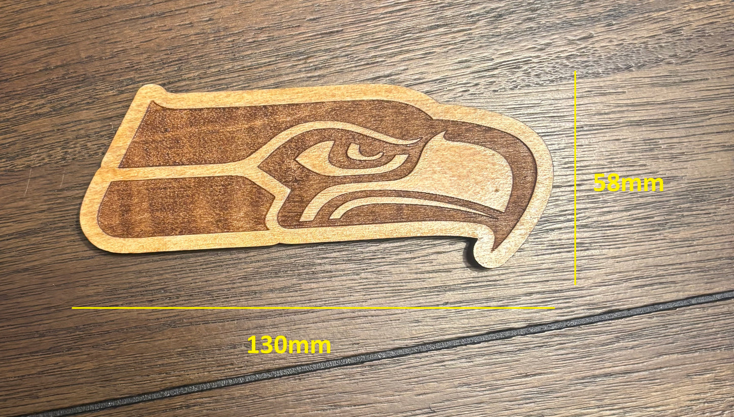 Stained basswood fridge magnet of the Seattle Seahawks football team logo