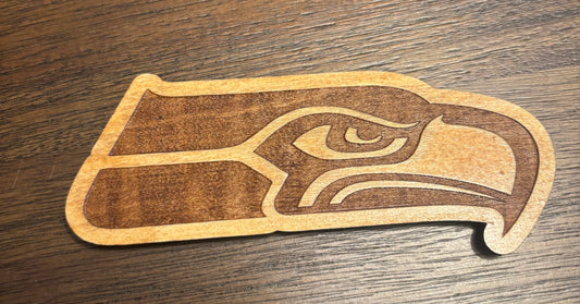 Stained basswood fridge magnet of the Seattle Seahawks football team logo