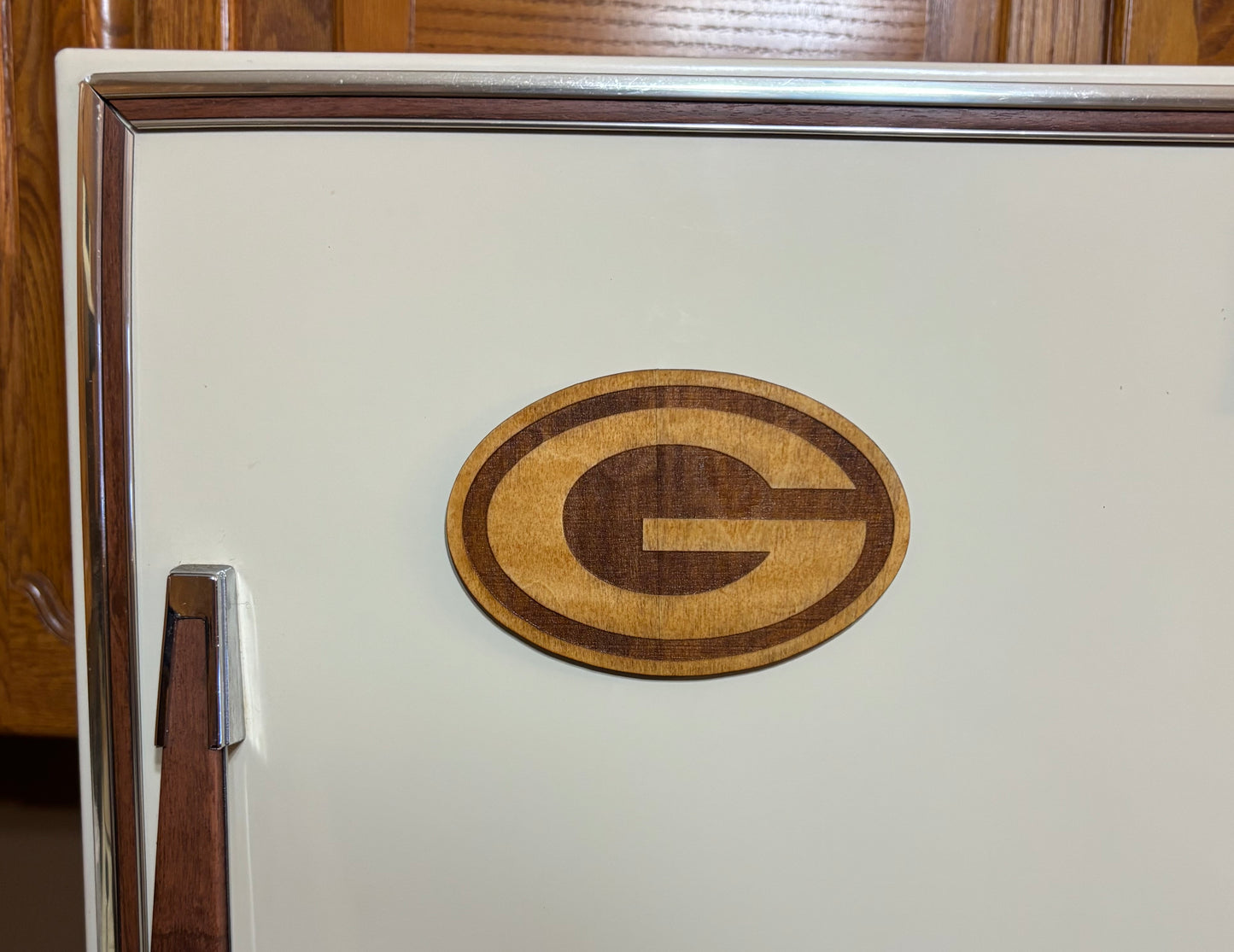 Stained basswood fridge magnet of the Green Bay Packers football team logo