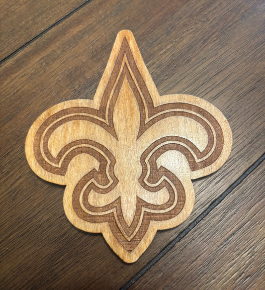 Stained basswood fridge magnet of the New Orleans Saints football team logo