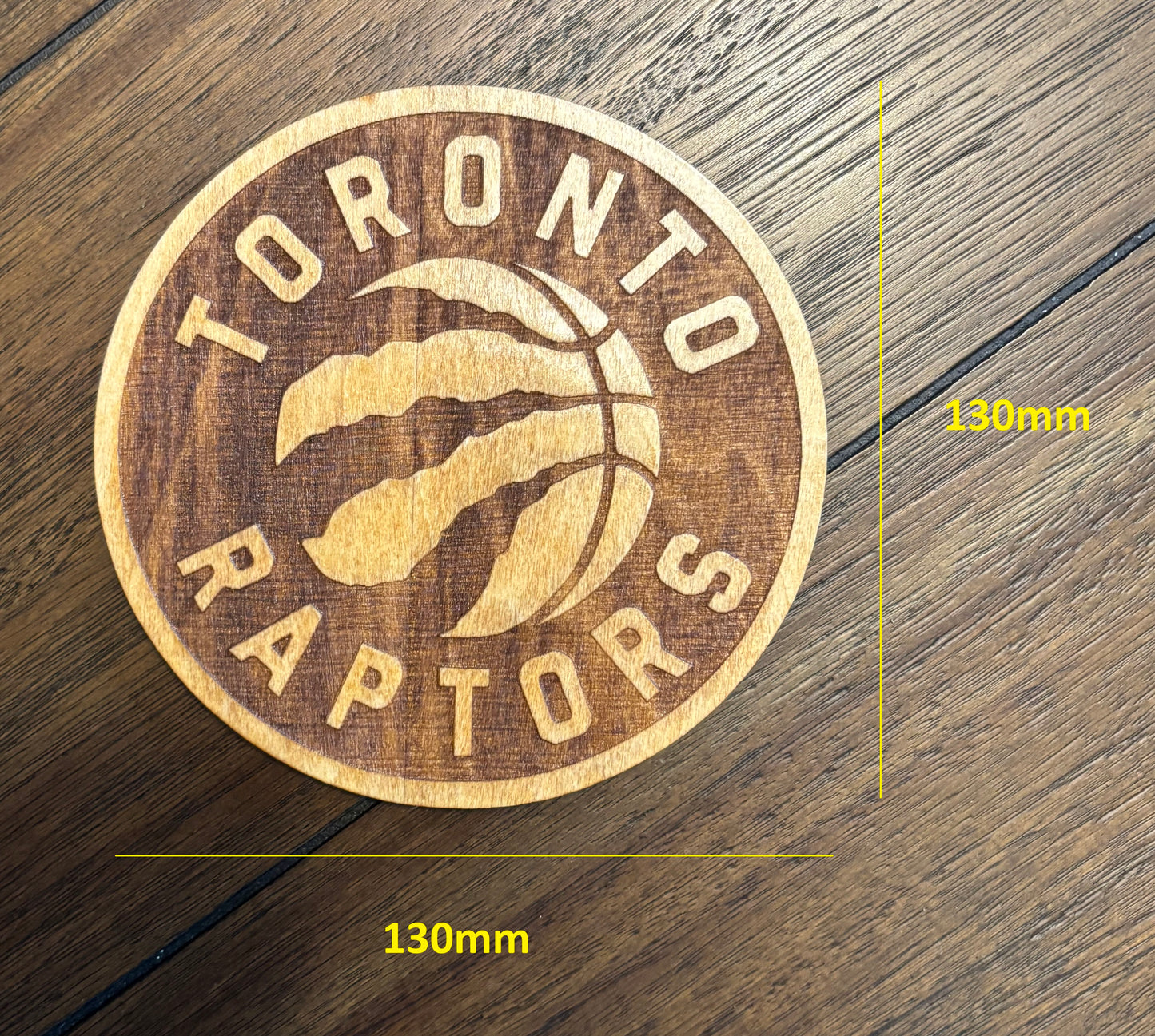 Stained basswood fridge magnet of the Toronto Raptors basketball team logo