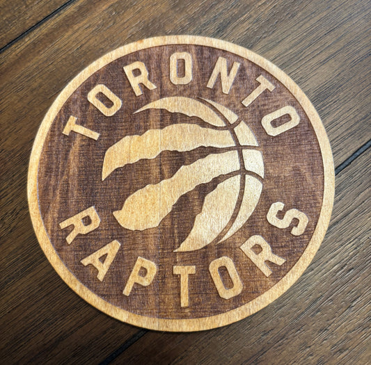 Stained basswood fridge magnet of the Toronto Raptors basketball team logo