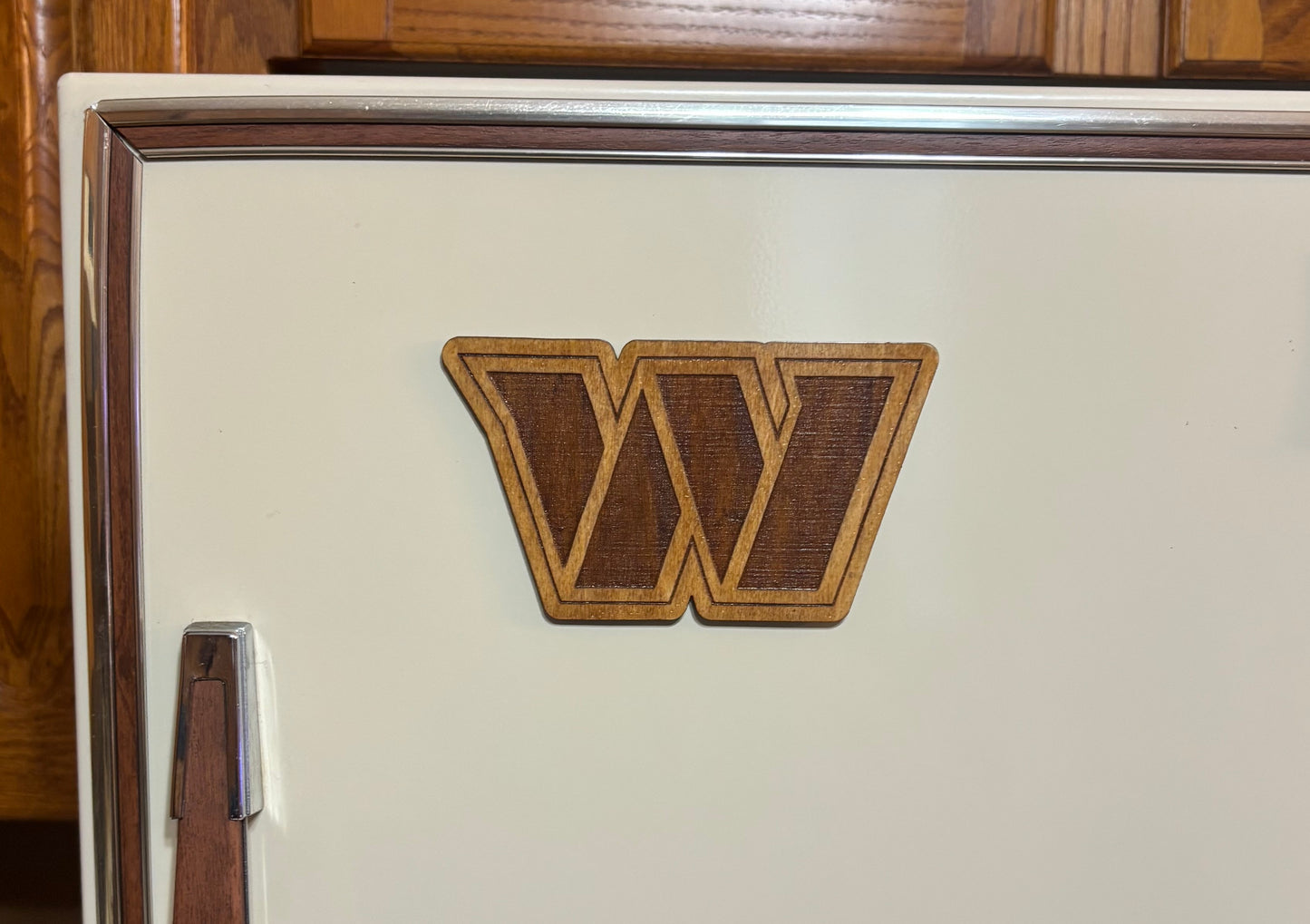 Stained basswood fridge magnet of the Washington Commanders football team logo