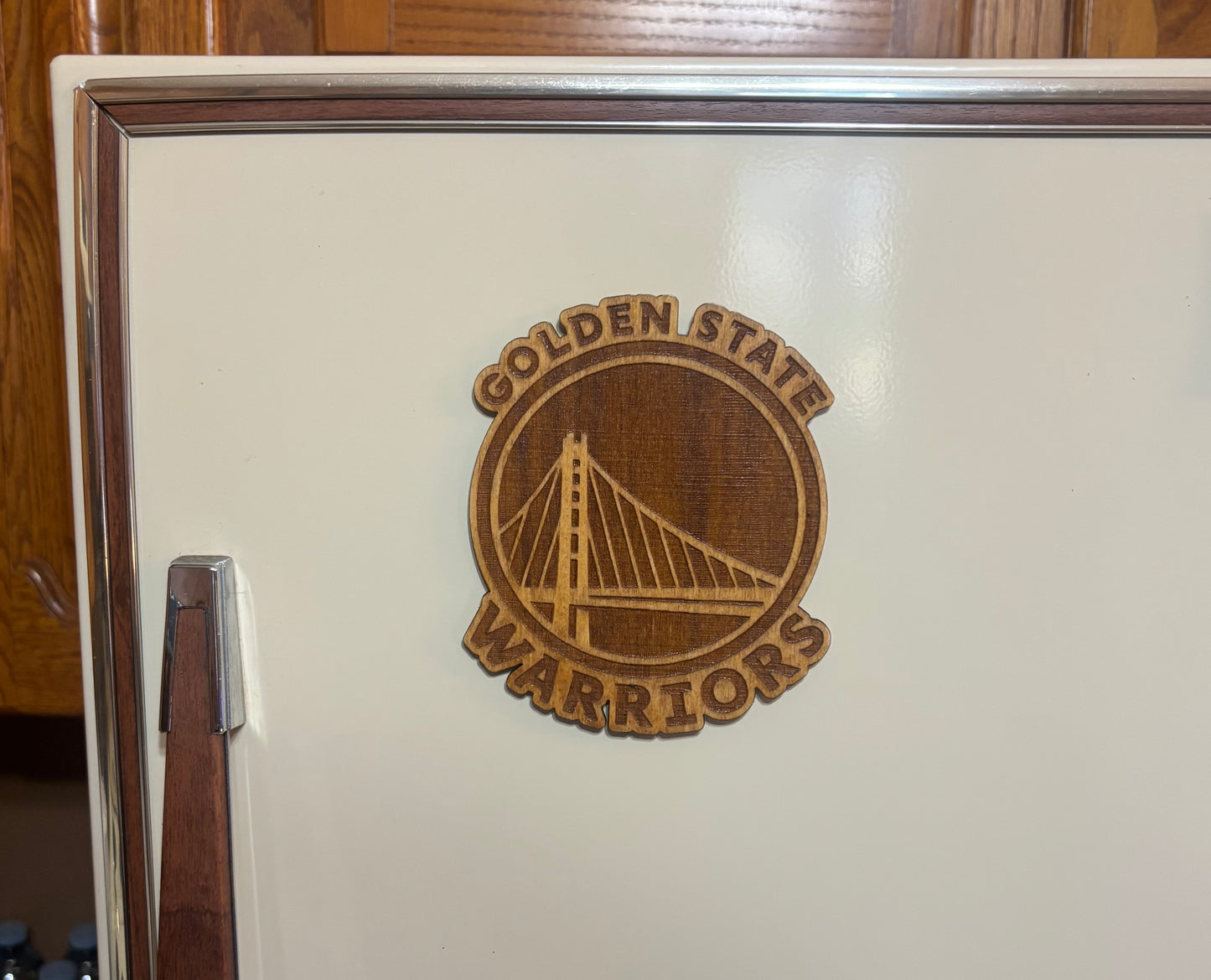 Stained basswood fridge magnet of the Golden State Warriors basketball team logo