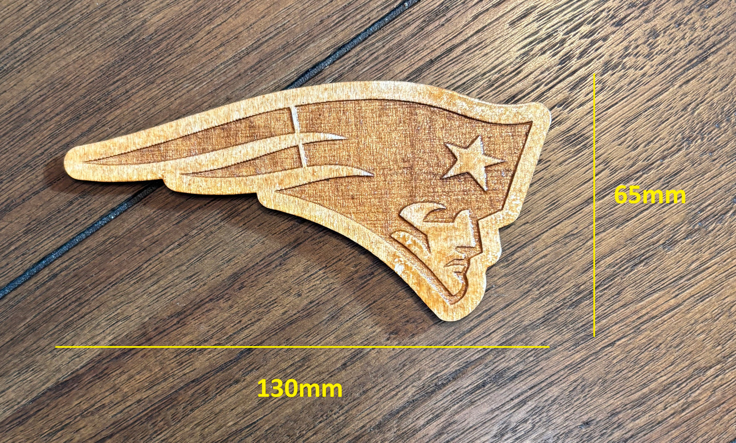 Stained basswood fridge magnet of the New England Patriots football team logo
