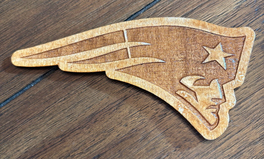 Stained basswood fridge magnet of the New England Patriots football team logo