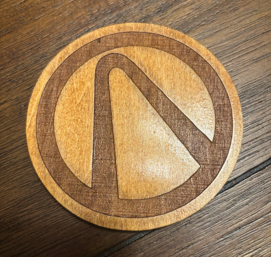 Stained basswood fridge magnet of the Vault logo from the Borderlands video games