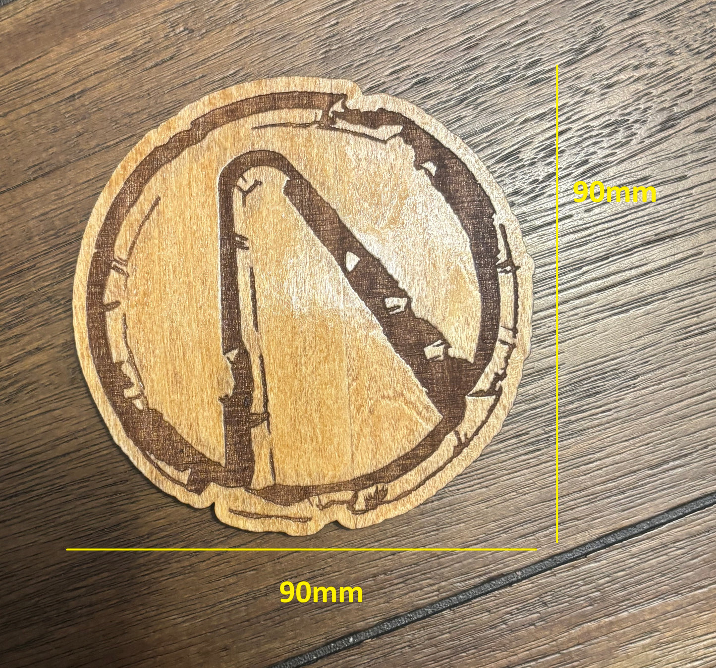 Stained basswood fridge magnet of the weathered Vault logo from the Borderlands video games