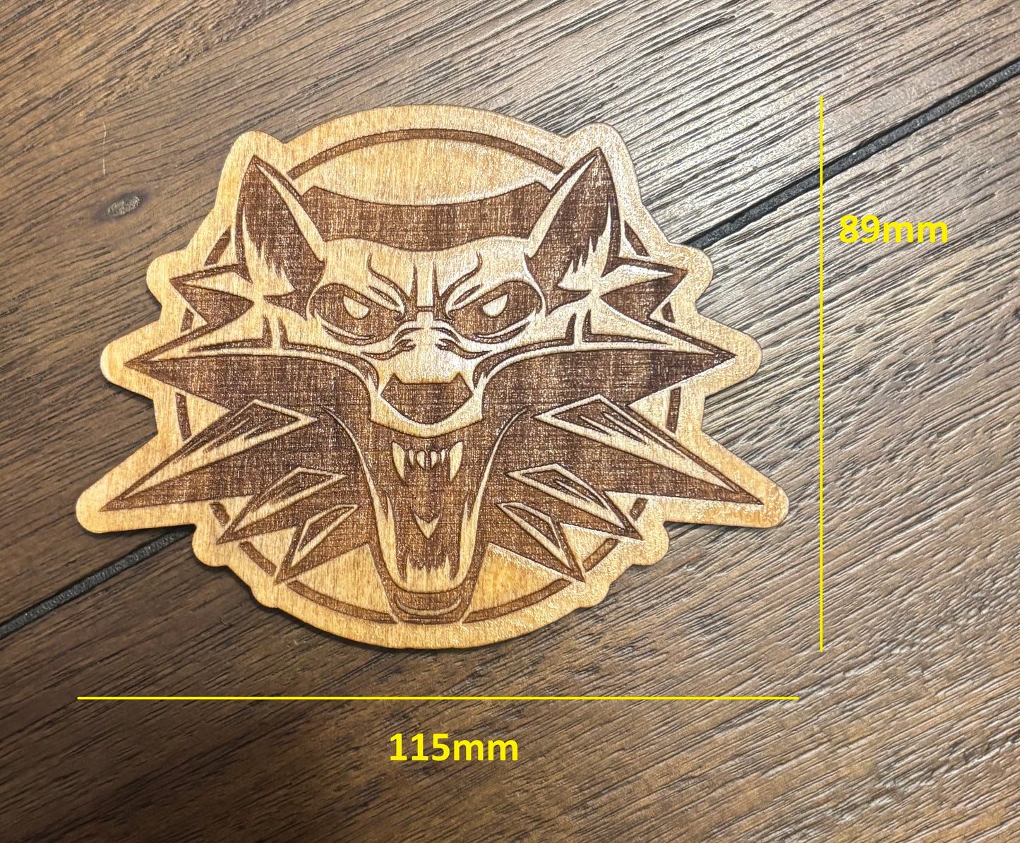 Stained basswood fridge magnet of the Witcher (alternative) logo