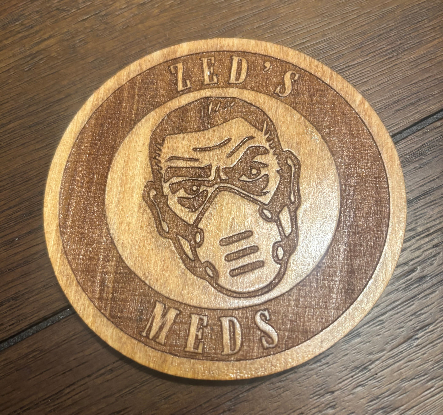Stained basswood fridge magnet of Zed's Meds from the Borderlands video games