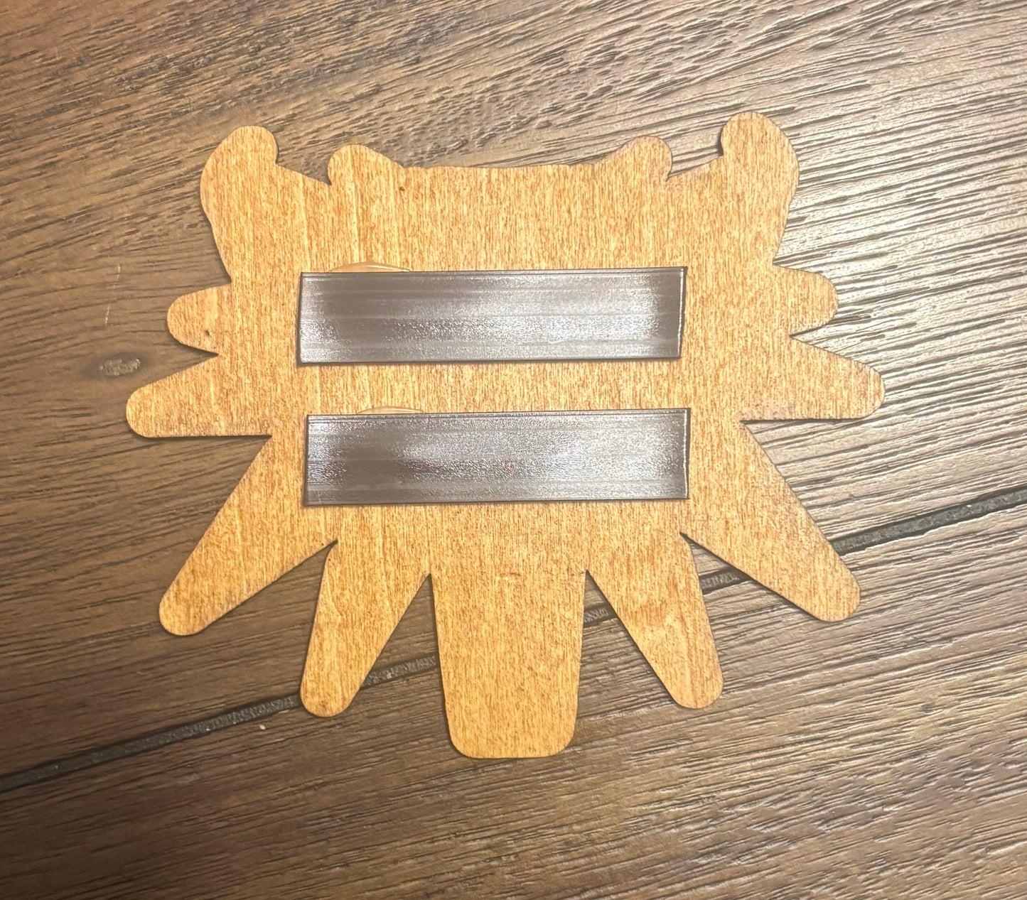Stained basswood fridge magnet of the Witcher logo