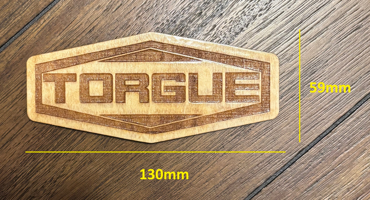 Stained basswood fridge magnet of the Torgue logo from the Borderlands video games