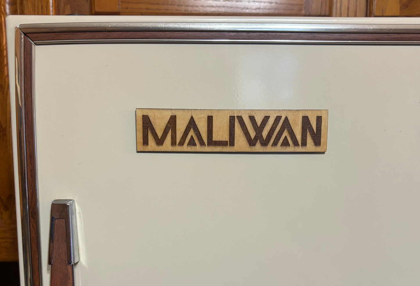 Stained basswood fridge magnet of the Maliwan logo from the Borderlands video games