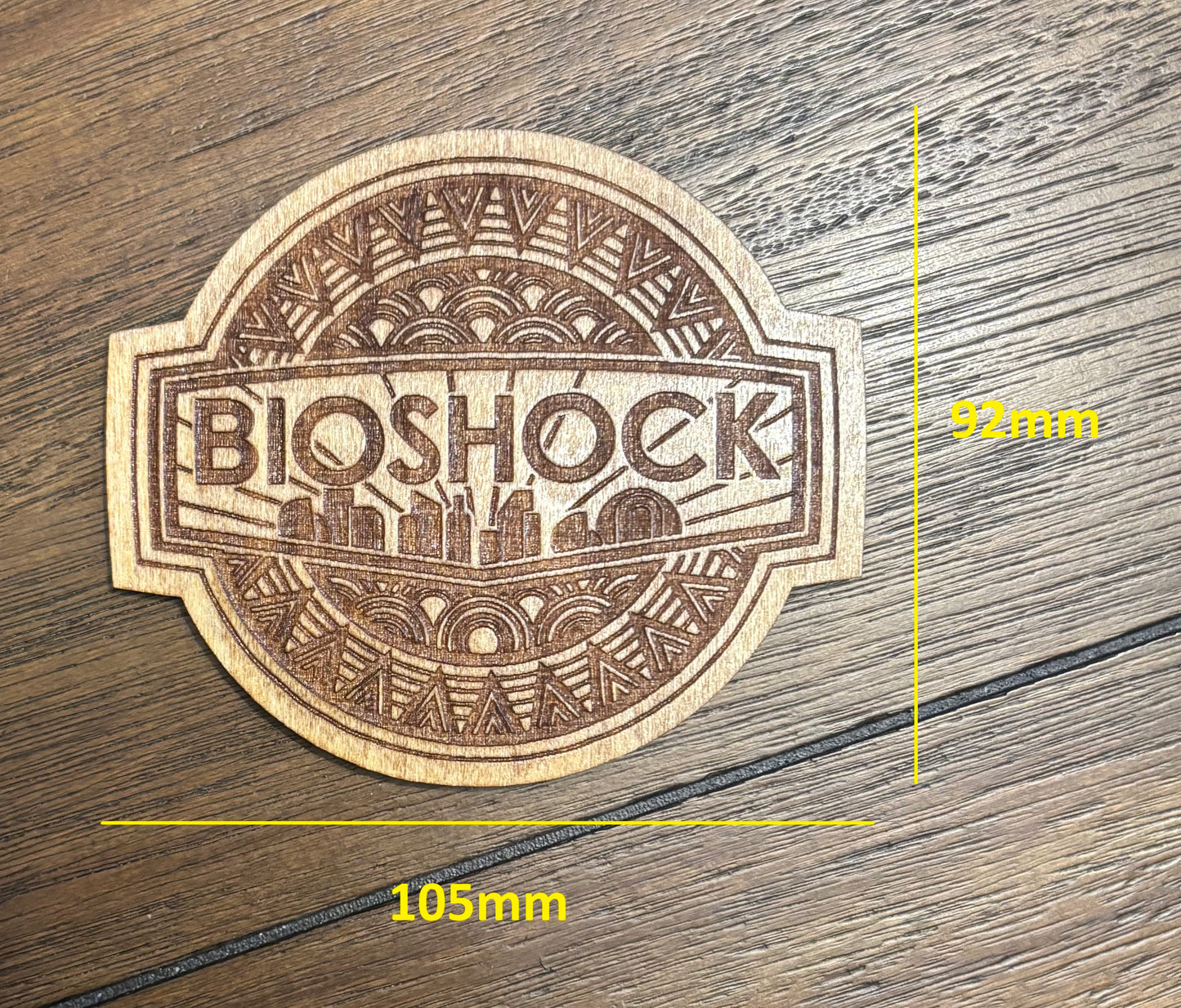 Stained basswood fridge magnet of Bioshock logo