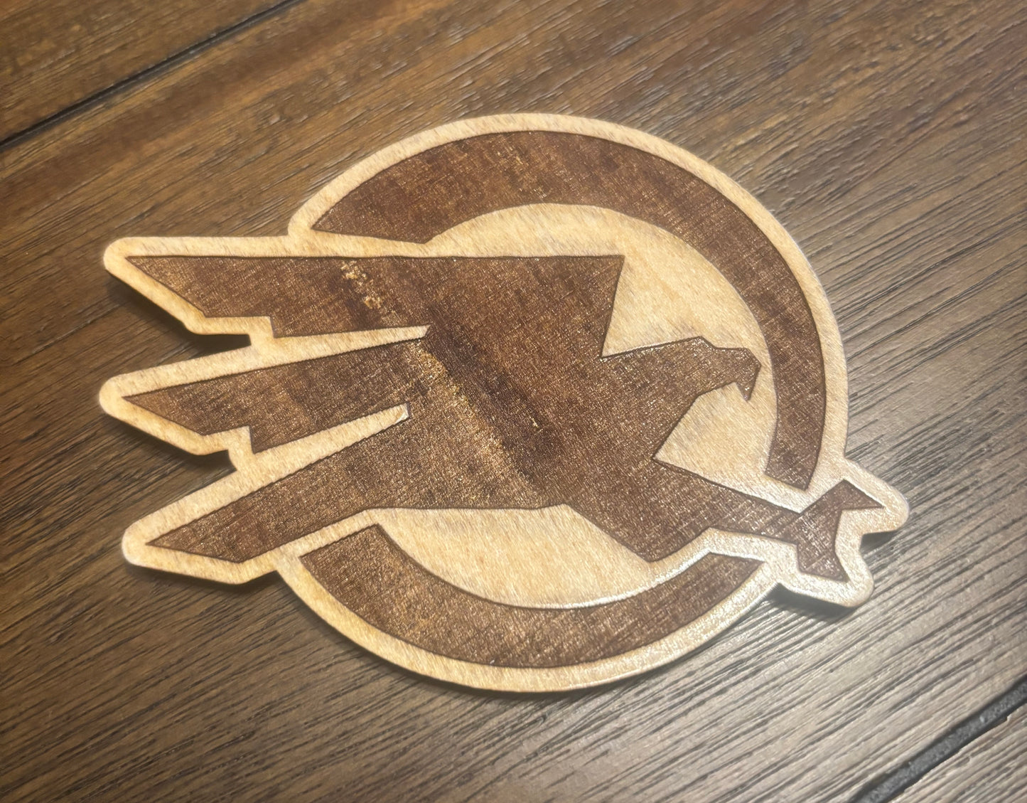 Stained basswood fridge magnet of the GDI logo from the Command & Conquer video games