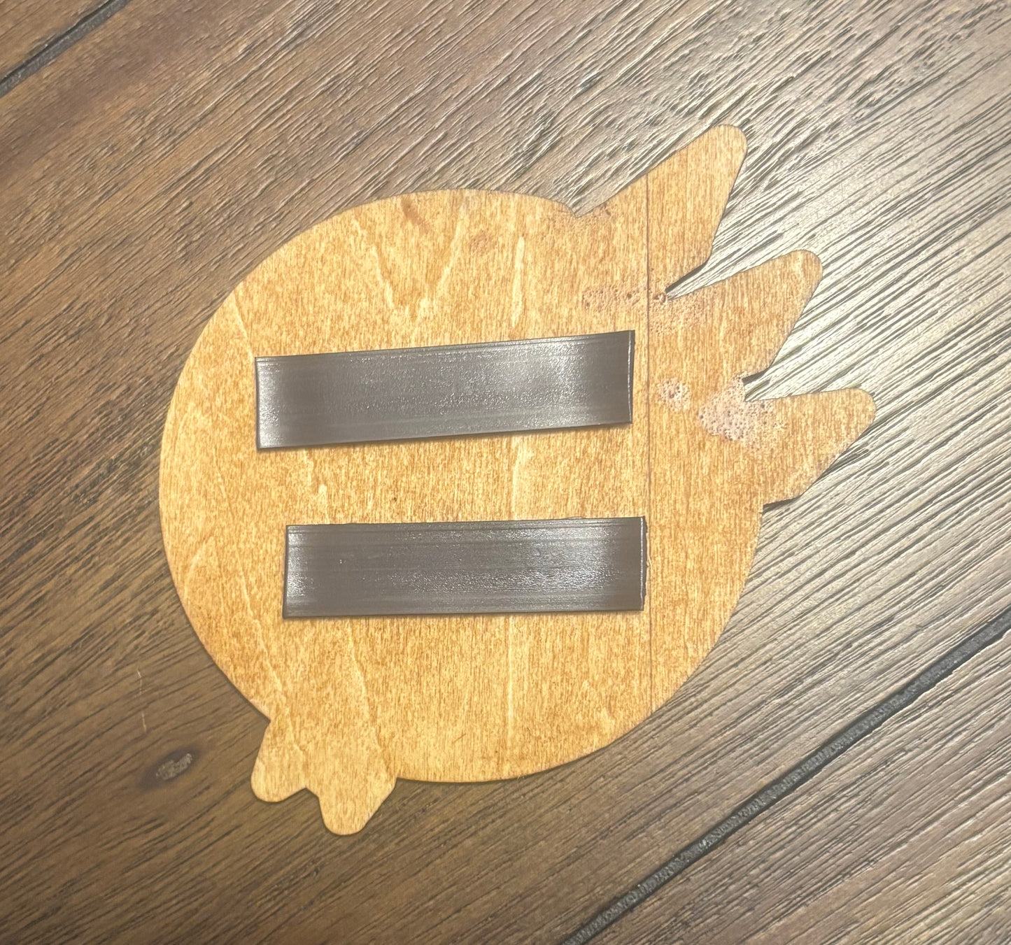 Stained basswood fridge magnet of the GDI logo from the Command & Conquer video games