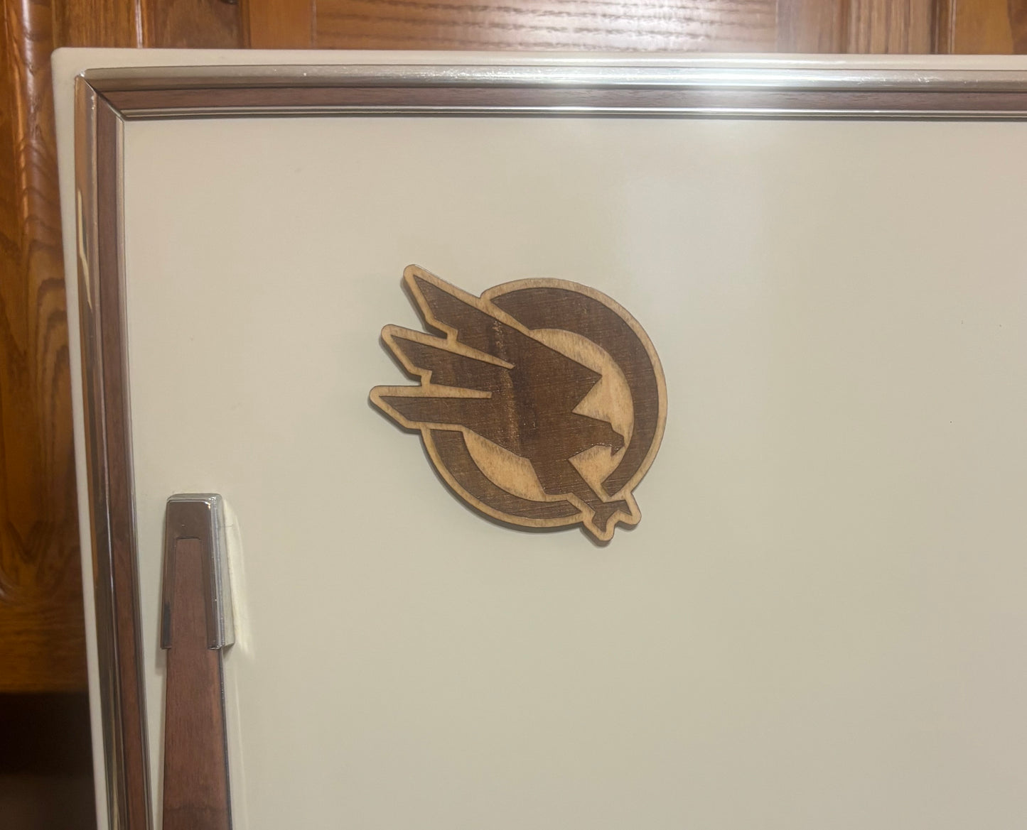 Stained basswood fridge magnet of the GDI logo from the Command & Conquer video games