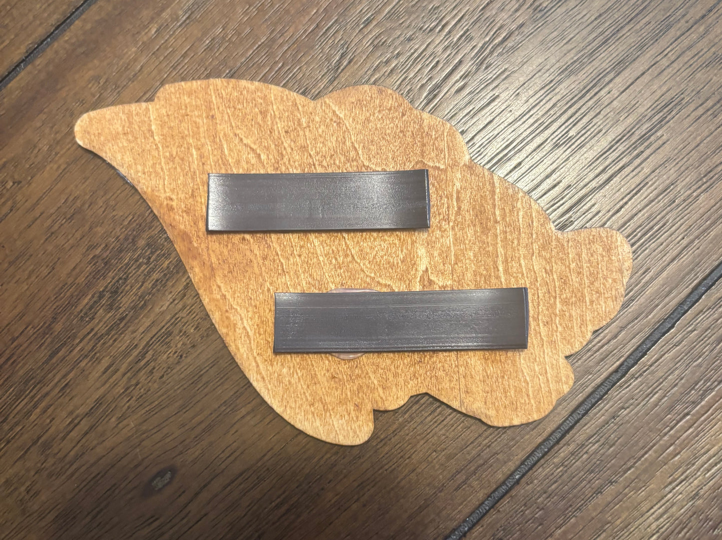 Stained basswood fridge magnet of the Windhelm sigil from the Skyrim video game
