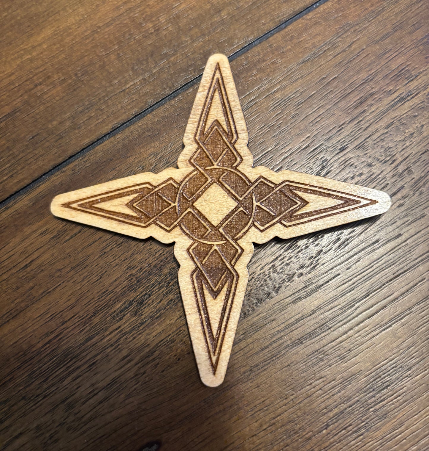 Stained basswood fridge magnet of the Dawnstar sigil from the Skyrim video game