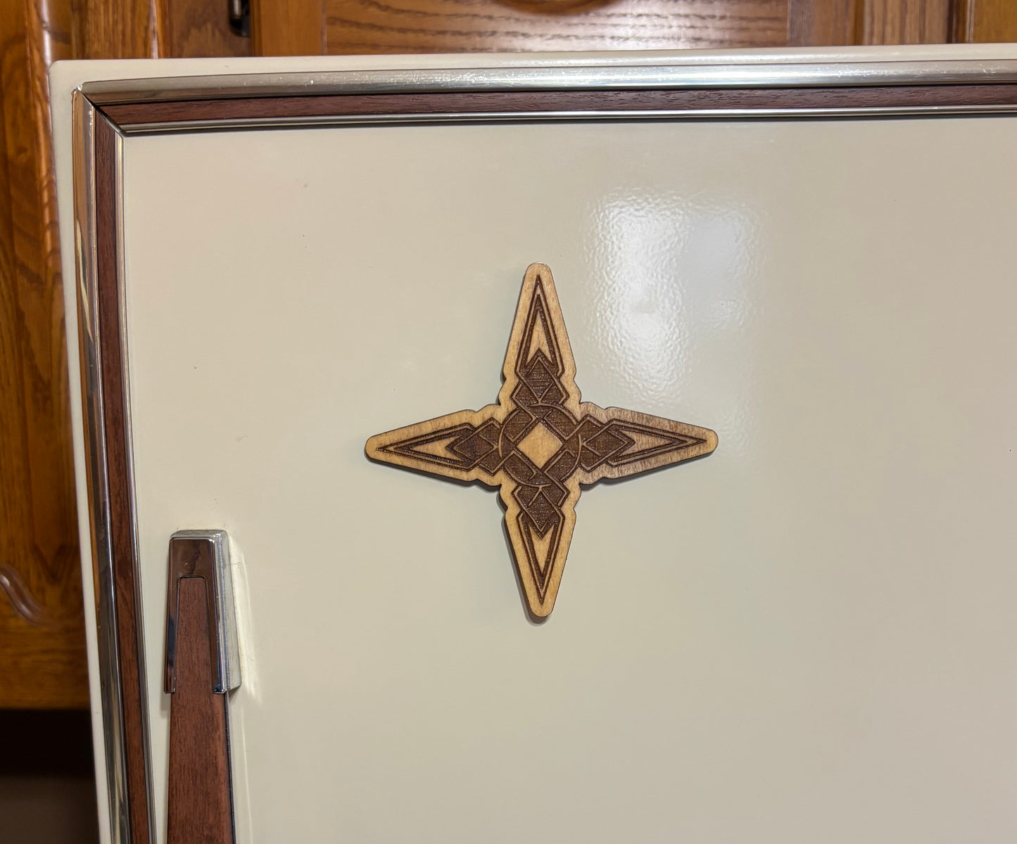 Stained basswood fridge magnet of the Dawnstar sigil from the Skyrim video game