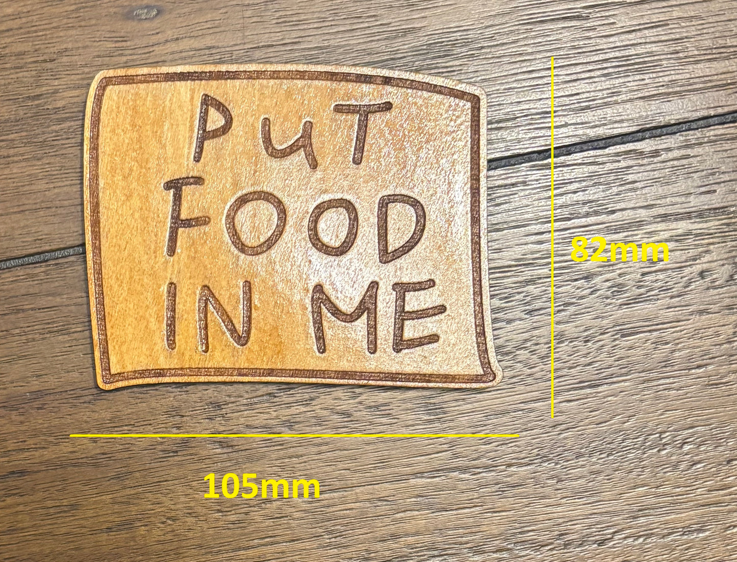 Stained basswood fridge magnet of Flanders' Put Food in Me sticky note from the Simpsons