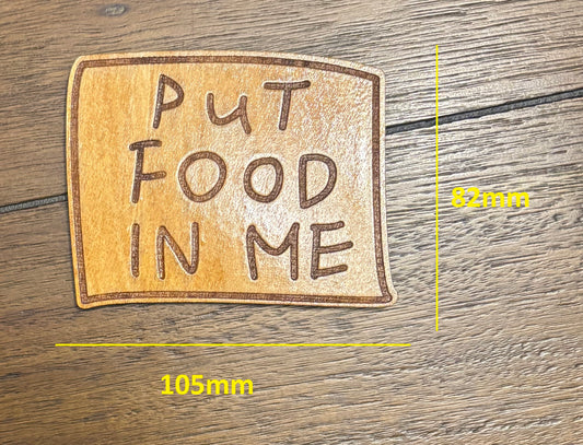 Stained basswood fridge magnet of Flanders' Put Food in Me sticky note from the Simpsons