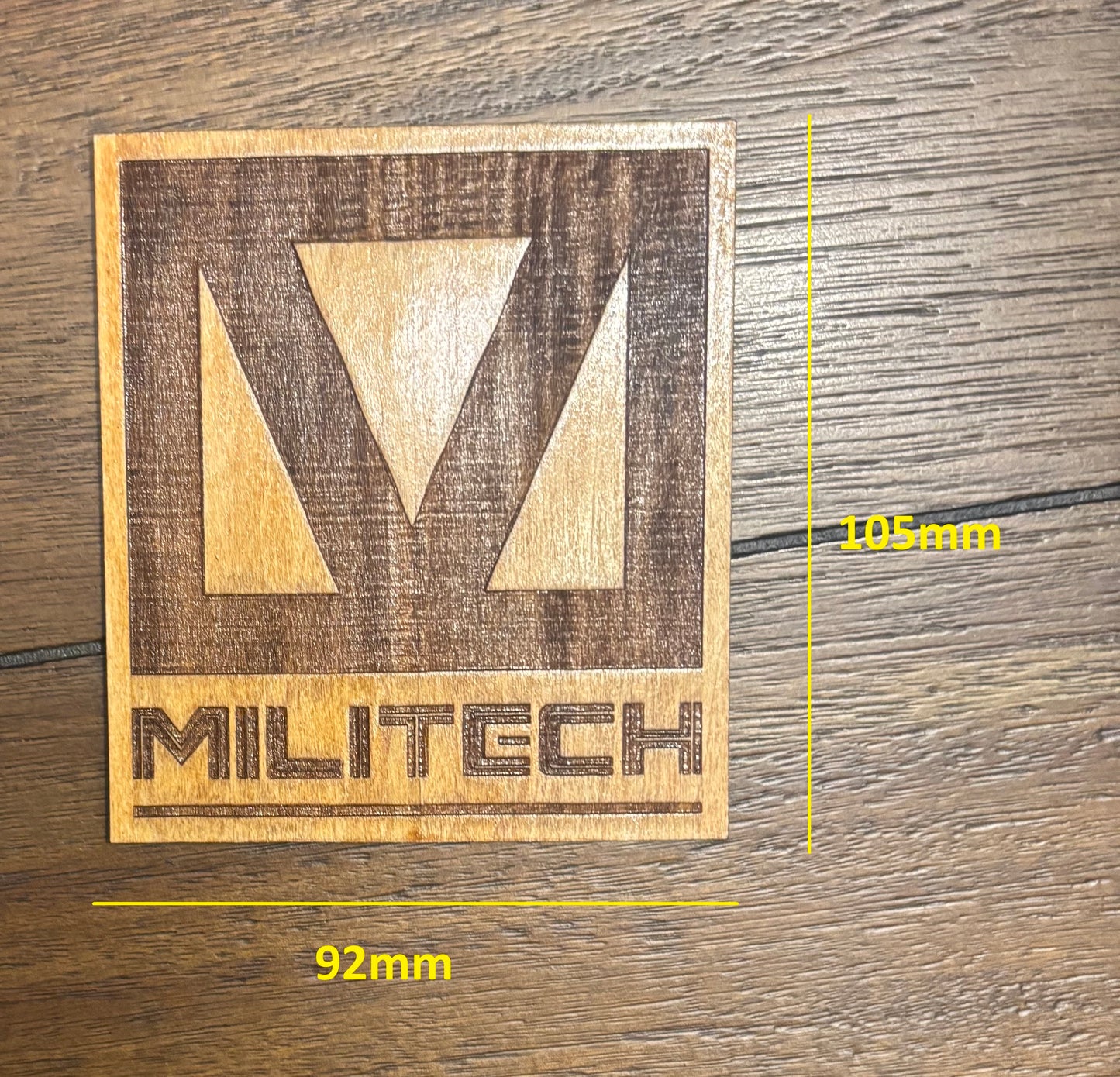Stained basswood fridge magnet of the Militech logo from the Cyberpunk 2077 video game