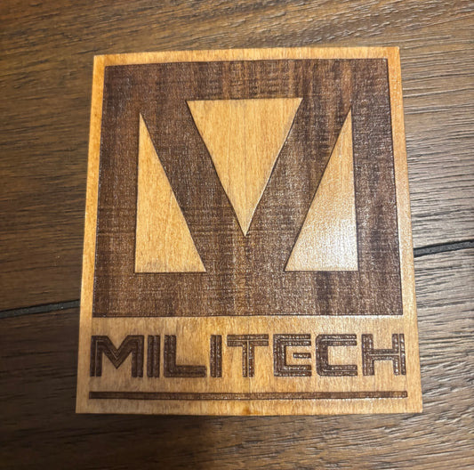 Stained basswood fridge magnet of the Militech logo from the Cyberpunk 2077 video game