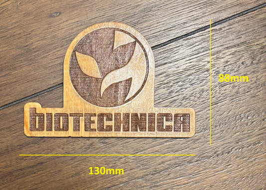 Stained basswood fridge magnet of the Biotechnica logo from the Cyberpunk 2077 video game