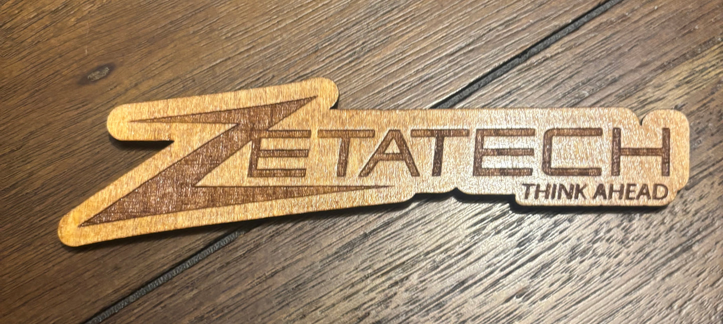 Stained basswood fridge magnet of the Zetatech logo from the Cyberpunk 2077 video game