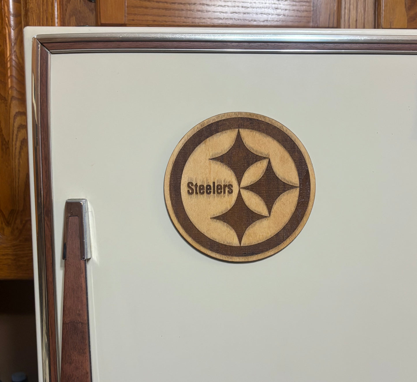 Stained basswood fridge magnet of the Pittsburgh Steelers football team logo