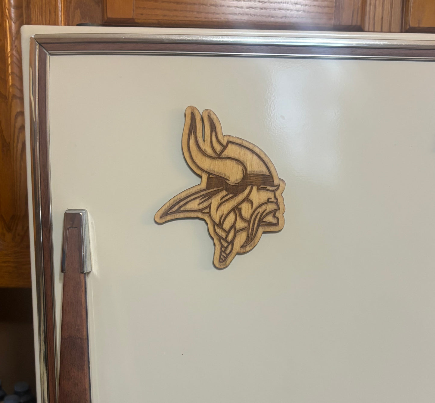 Stained basswood fridge magnet of the Minnesota Vikings football team logo