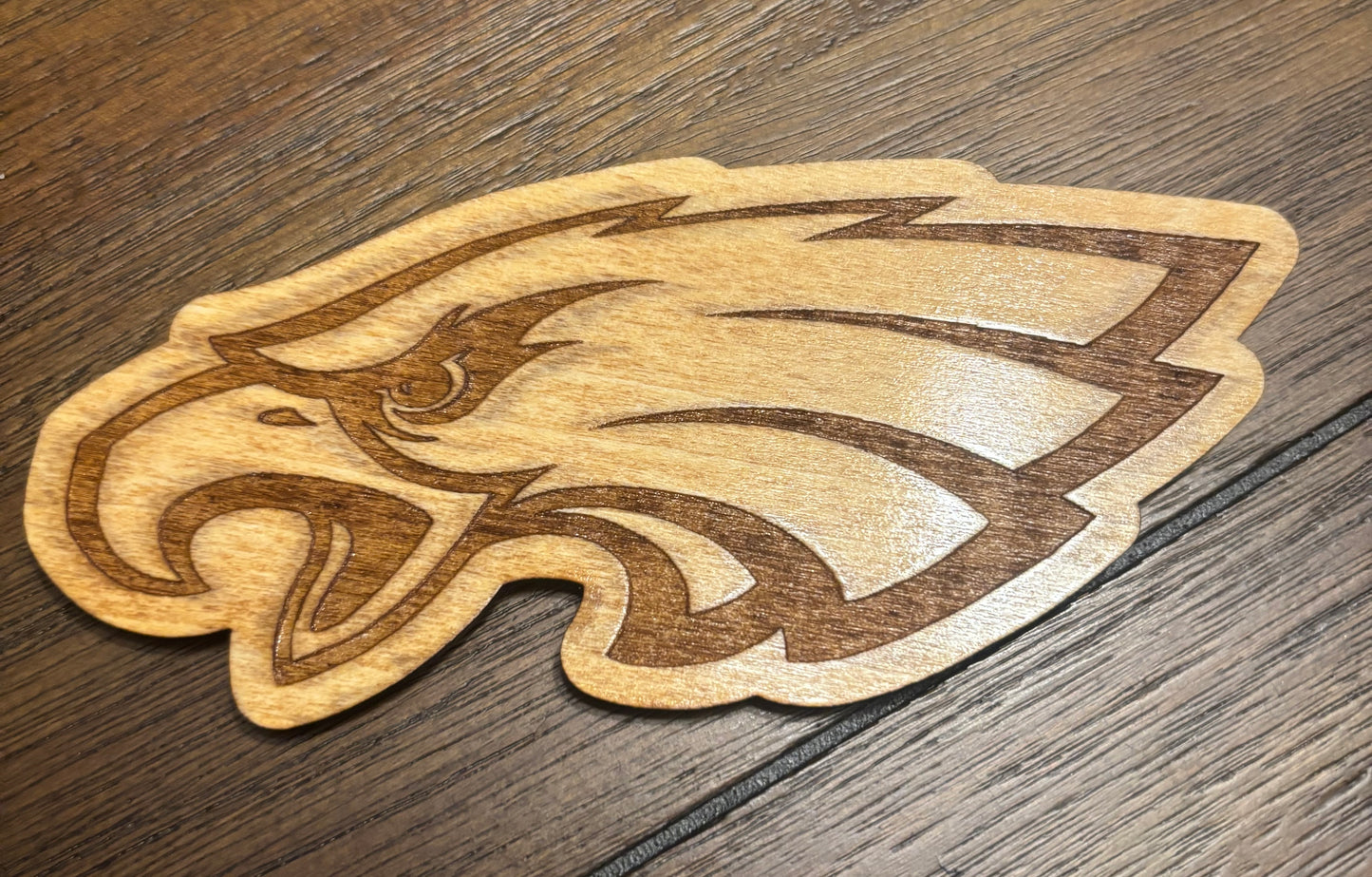 Stained basswood fridge magnet of the Philadelphia Eagles football team logo
