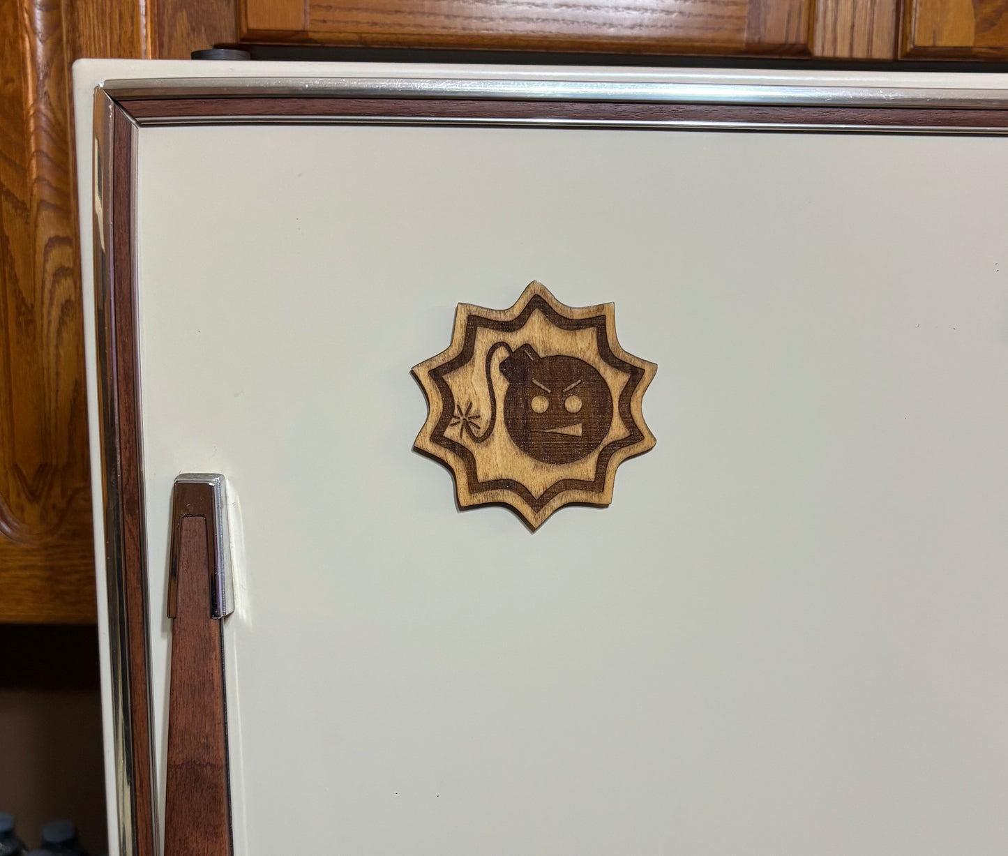 Stained basswood fridge magnet of the Series Sam logo